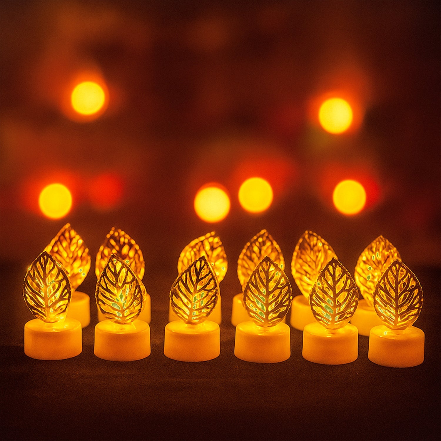 Decorative Golden Leaf Shaped Flameless LED Candles (12 Pc) Decorative Golden Leaf Shaped Flameless LED Candles (12 Pc)